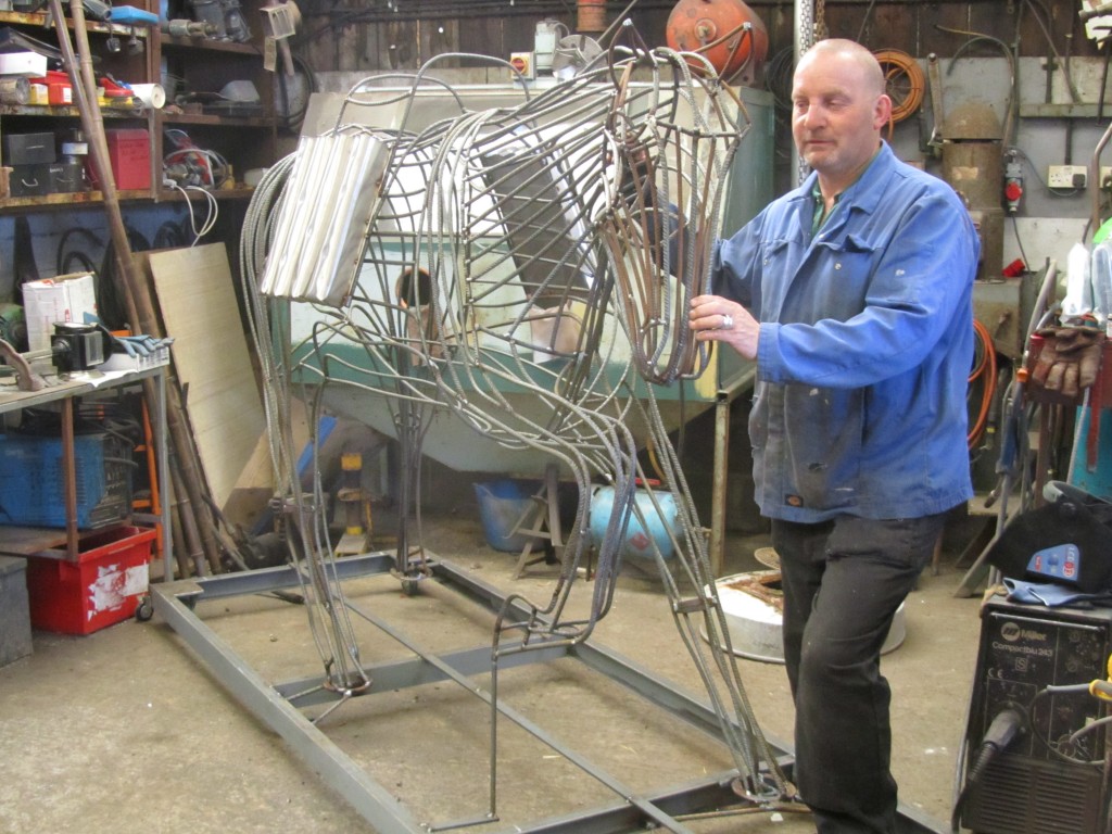 Blacksmith, Andrew Smith, during the construction of our 'Horse of War'. The installation represents a permanent legacy to the role of horses in the conflict. Local school children voted overwhelmingly on the name 'George' - so 'George' is fully installed adjacent to the War Memorial
